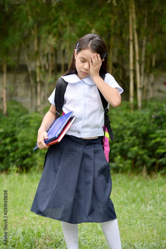 Unhappy Prep Asian School Girl With Notebooks Unhappy Prep Asian School Girl With Notebooks