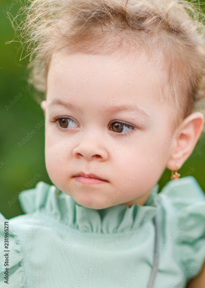 portrait of little girl outdoors in summer portrait of little girl outdoors in summer