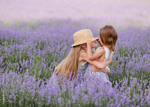 portrait of two sisters in a lavender field