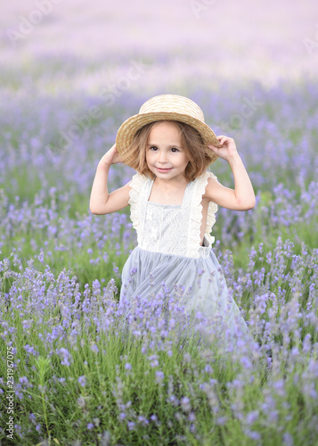 portrait of little girl outdoors in summer