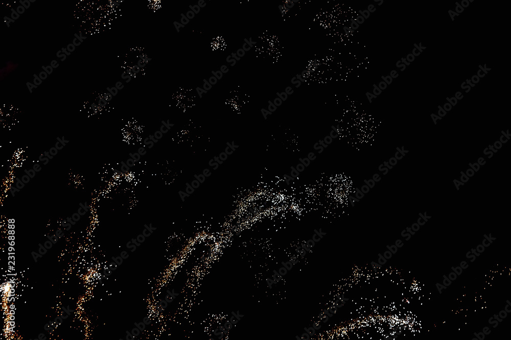Fireworks in the night sky. Texture salute. Abstract photo of flares on a black background. Photos of lights salute in the sky. Image of salute flashes. Texture of colored lights. Fireworks in the night sky. Texture salute. Abstract photo of flares on a black background. Photos of lights salute in the sky. Image of salute flashes. Texture of colored lights.