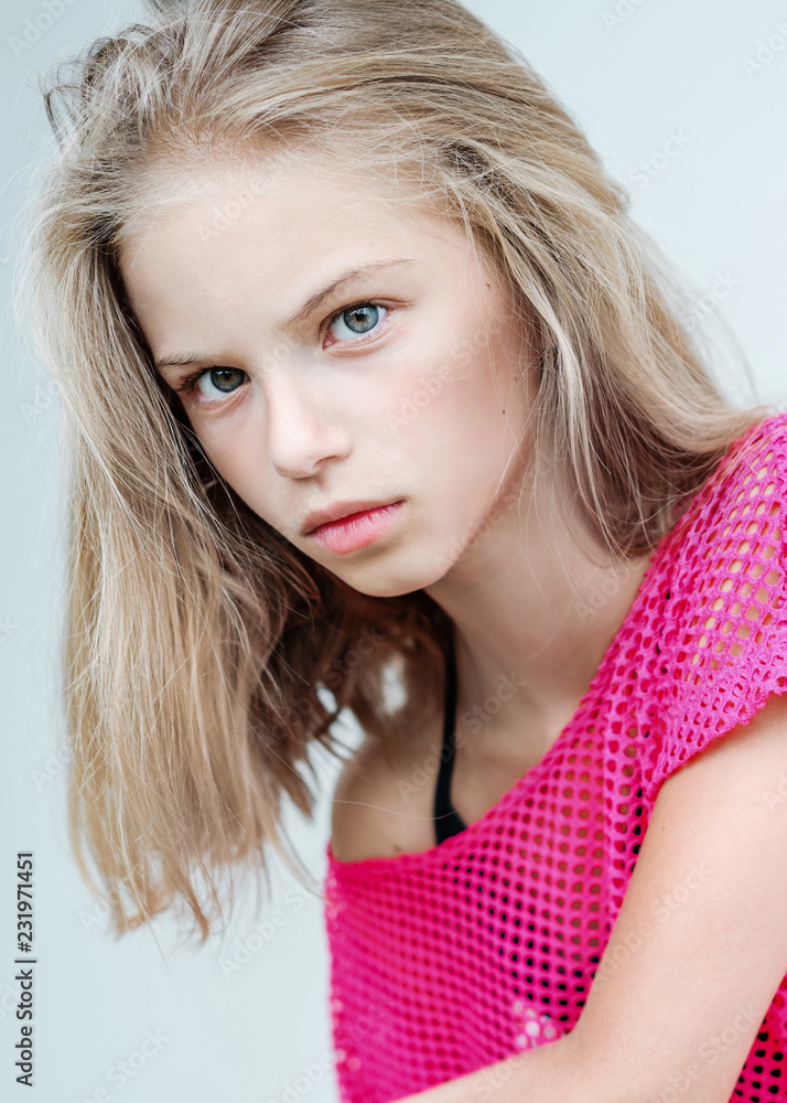 Fototapeta premium portrait of little girl outdoors in summer