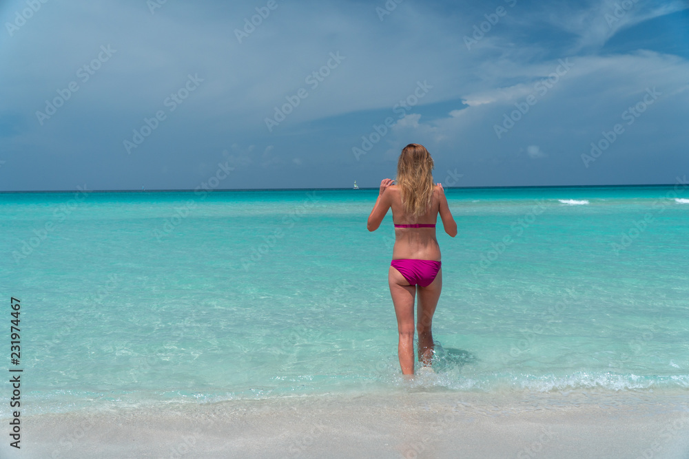 Blonde girl on the Varadero beach, Cuba.