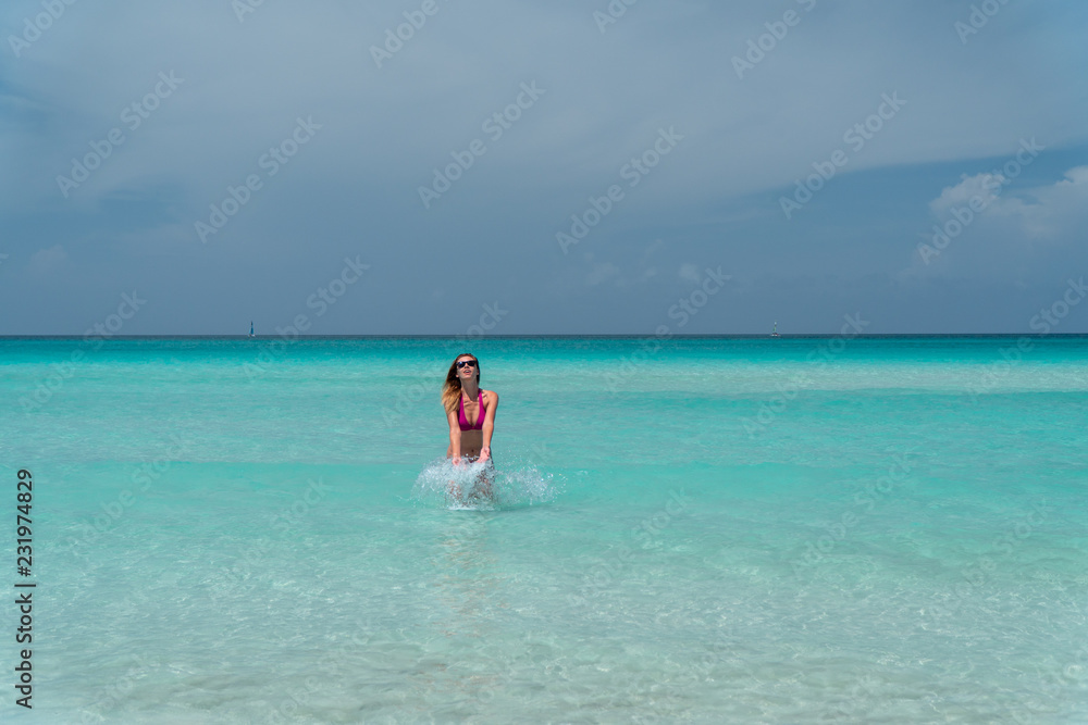 Blonde girl on the Varadero beach, Cuba.