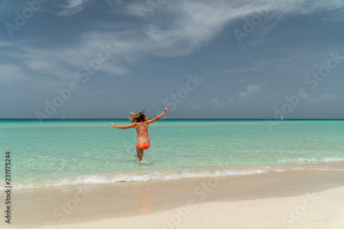 Blonde girl on the Varadero beach, Cuba.