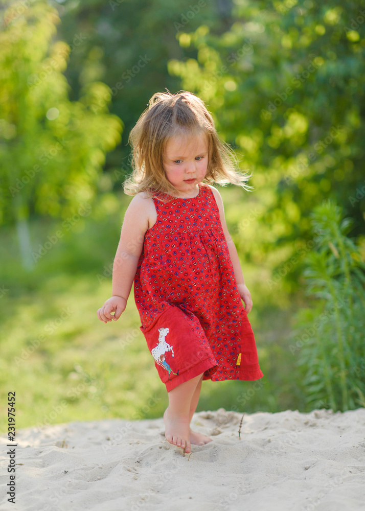 portrait of little girl outdoors in summer portrait of little girl outdoors in summer