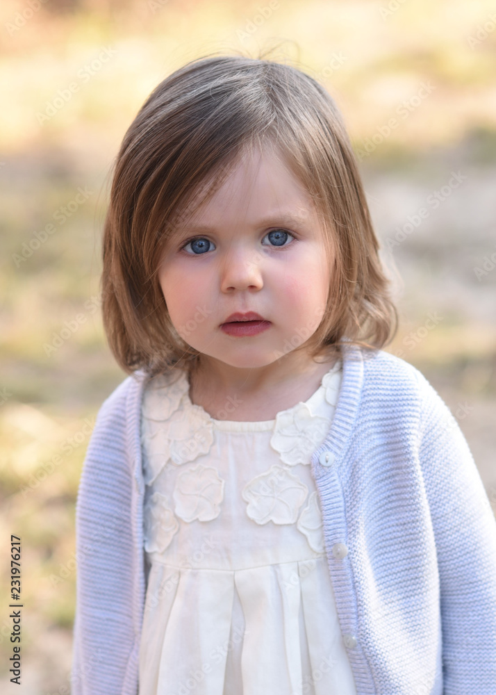 portrait of little girl outdoors in summer portrait of little girl outdoors in summer
