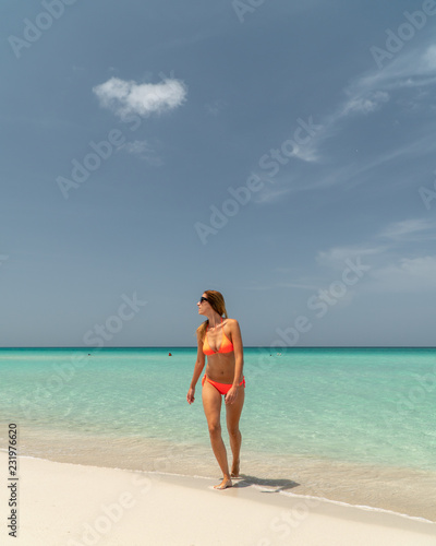 Blonde girl on the Varadero beach, Cuba. © danmal25