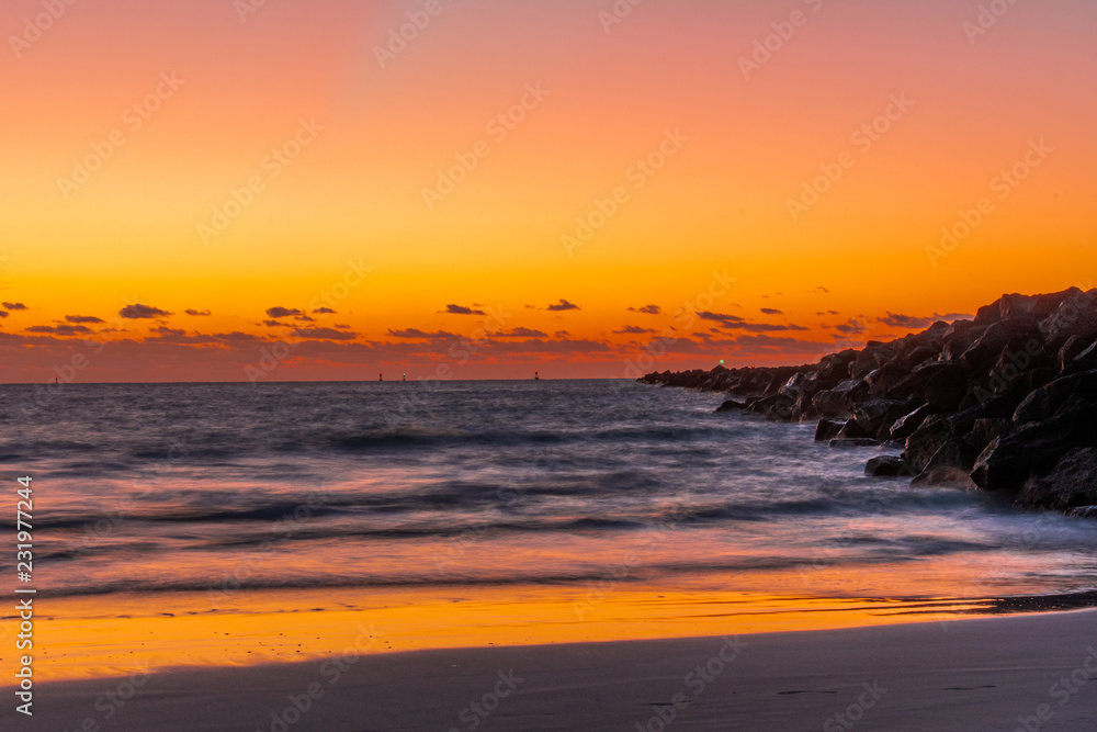 Sunrise or Sunset by the beach