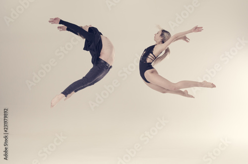 acrobat sensual dancers on empty background