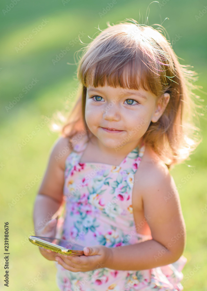 portrait of little girl outdoors in summer portrait of little girl outdoors in summer