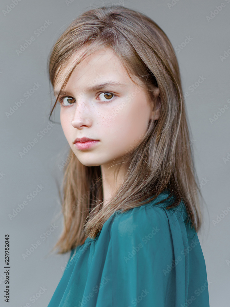 Fototapeta premium portrait of little girl outdoors in summer