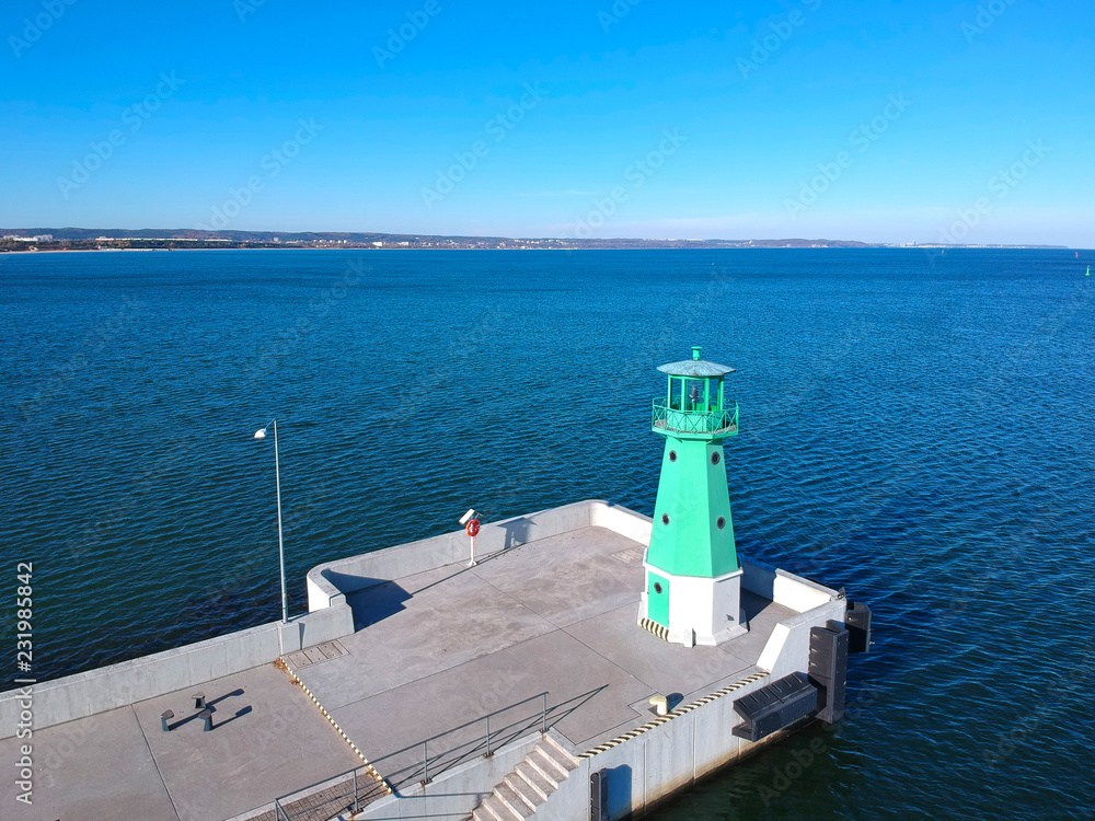 Lighthouse at the breakwater of Baltic Sea in Gdansk, Poland