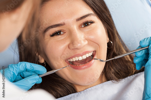 woman patient and dentist