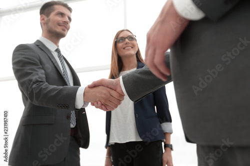 Business shaking hands in the office © ASDF