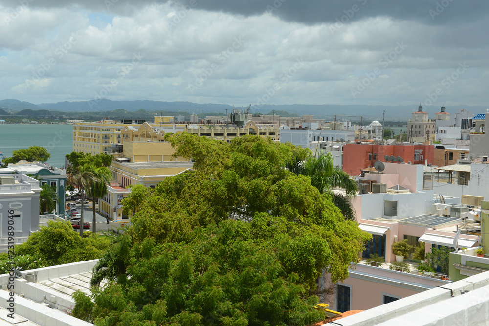 Fototapeta premium Old San Juan City Skyline, from top of Castillo San Cristobal, San Juan, Puerto Rico. Castillo San Cristobal is designated as UNESCO World Heritage Site since 1983.