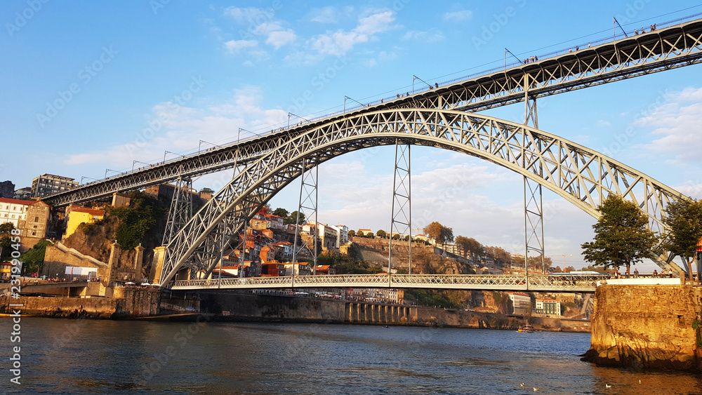 View of the Dom Luis I Bridge and Douro river from Vila Nova de Gaia in Porto, Portugal