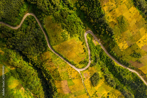 Aeriel view of curvy road in Guatemala volcanic farmland