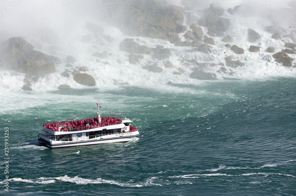 View at boat for tourists near  Niagara Falls from Canadian side at summer time