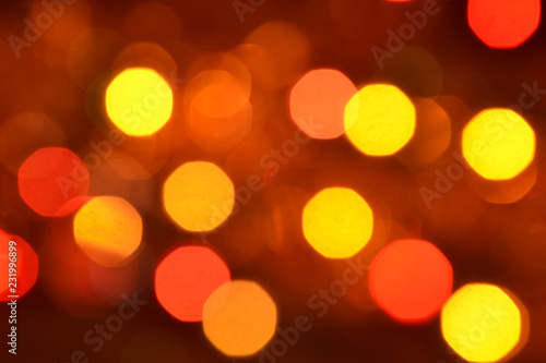 Orange and red bokeh. The background with boke. Abstract texture