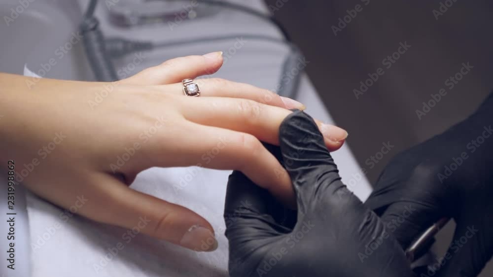Correction of female nails with nippers Correction of female nails with nippers