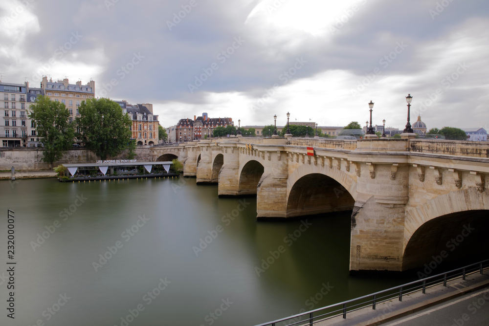 Paris, France - May 25, 2018: Pont Neuf in central Paris. The Pont Neuf is the oldest standing bridge across the river Seine in Paris