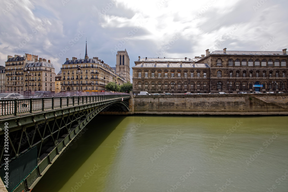 Paris, France - May 25, 2018: Notre Dame cathedral and Haussman period buildings viewed from Gesvres Quay