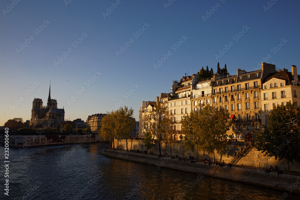 Paris, France - October 21, 2018: Notre Dame cathedral at sunset in Paris