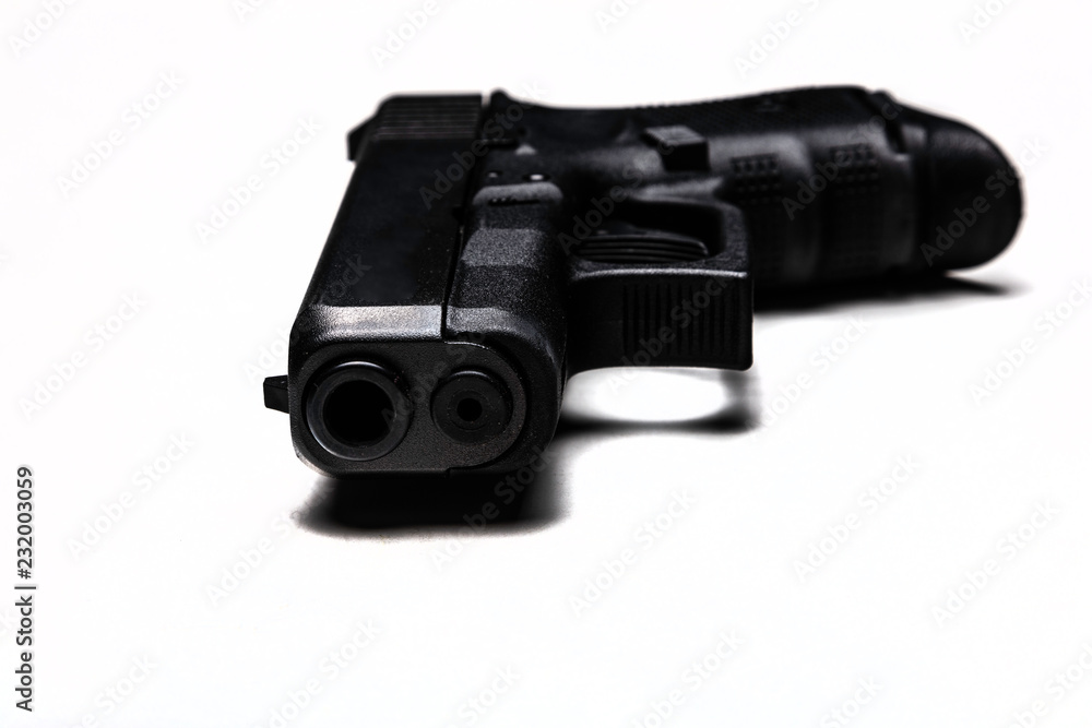 Automatic 9mm pistol isolated on a white background Automatic 9mm pistol isolated on a white background
