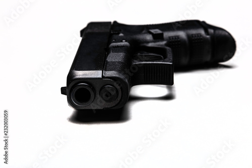 Automatic 9mm pistol isolated on a white background