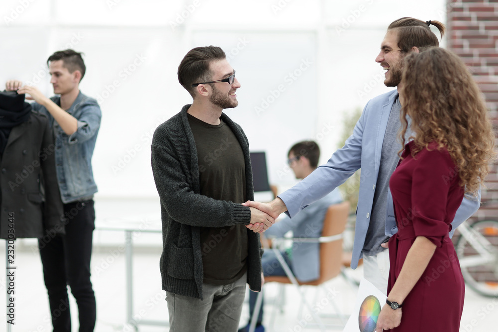 closeup.the handshake between the designer and the client closeup.the handshake between the designer and the client