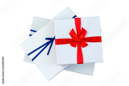 Wallpaper Mural three gift boxes with ribbon blue and red bow on white background. Torontodigital.ca