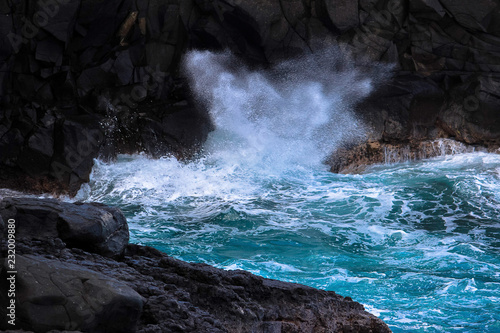 Waves Crashing on Lava Rocks