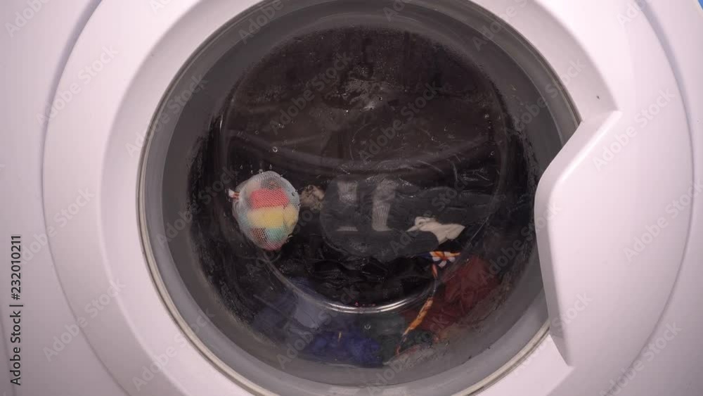 Front load washing machine in action Front load washing machine in action
