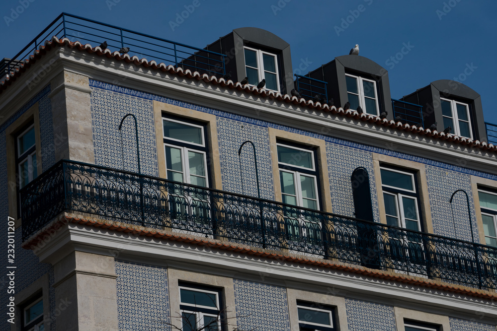Fototapeta premium Old building facade with Lisbon traditional tiles. Lisbon, Portugal