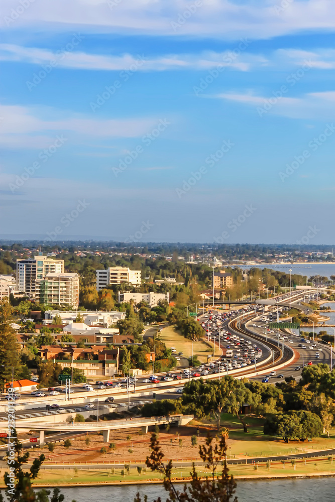 Fototapeta premium View of South of Perth skyline and winding Kwinana Freeway towards Swan River