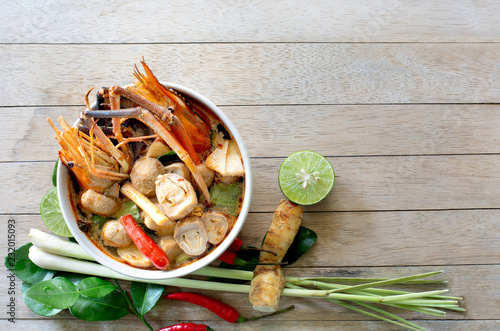 River prawn spicy soup (Tom yum koong) Thai food and ingredient vegetables
