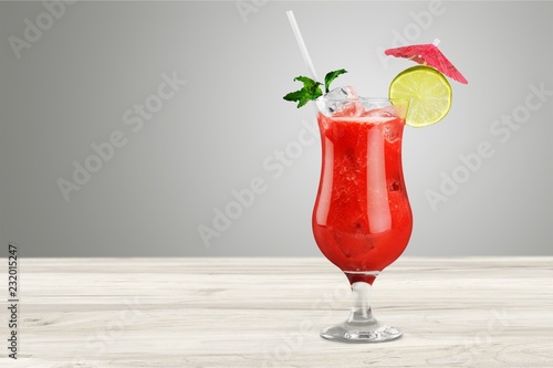 Glass of alcohol  cocktail on background