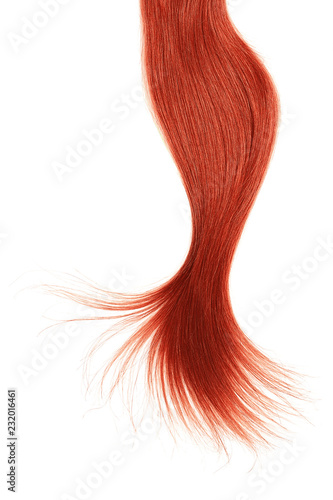 Curl of natural red hair on white background