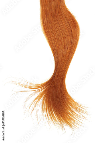 Curl of natural red hair on white background