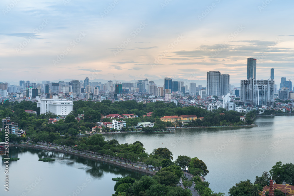 Fototapeta premium Aerial view of Hanoi skyline at West Lake or Ho Tay. Hanoi cityscape at twilight
