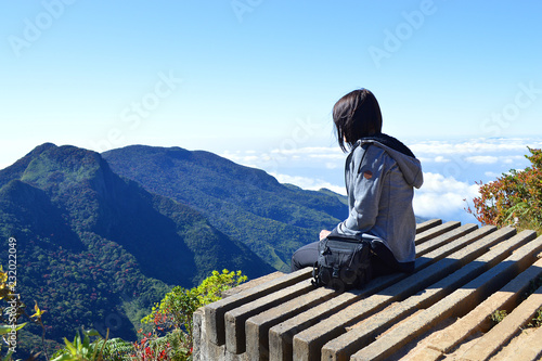 girl enjoying the view on the observation deck of Horton plains