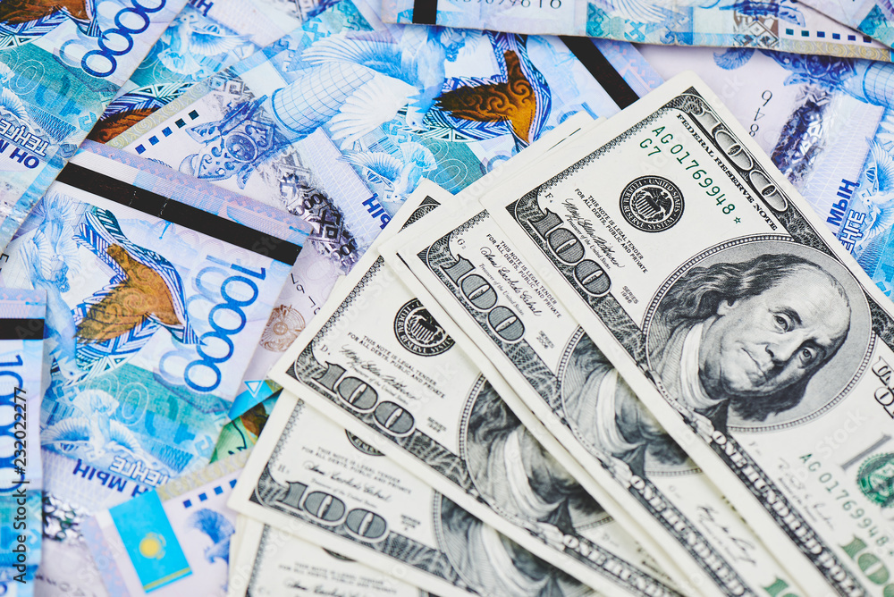 Tenge. Kazakh money and dollars. Background of the money. Tenge. Kazakh money and dollars. Background of the money.