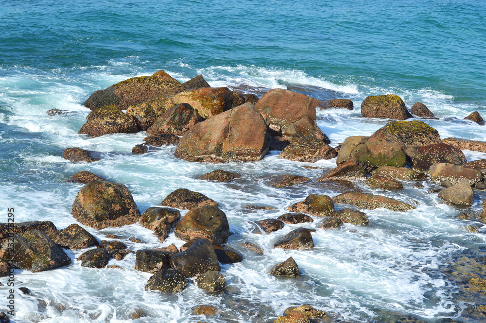 rocks on the shore of the Indian ocean at mirissa beach of the island of Ceylon rocks on the shore of the Indian ocean at mirissa beach of the island of Ceylon