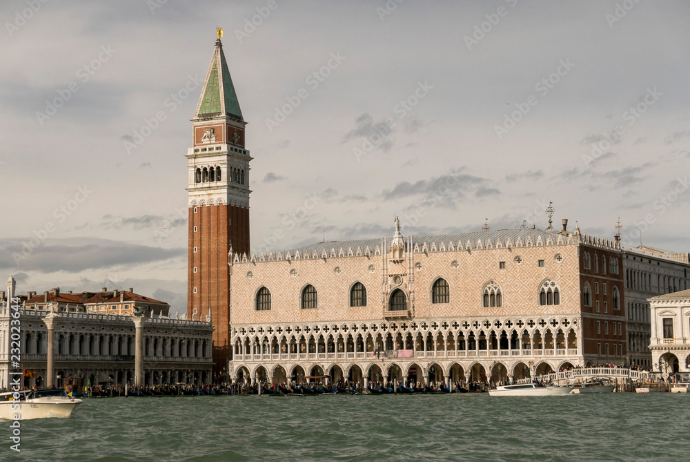 VENICE, ITALY- OCTOBER 30, 2018: St Mark's Campanile is the bell tower of St Mark's Basilica in Venice, Italy, located in the Piazza San Marco. 