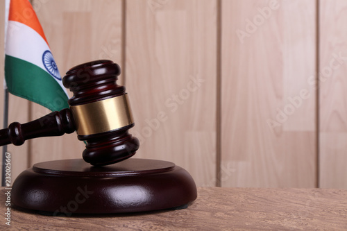 Flag of India and a gavel on a sounding block