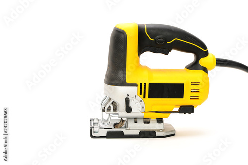 Isolated left side electric jig saw on a white background