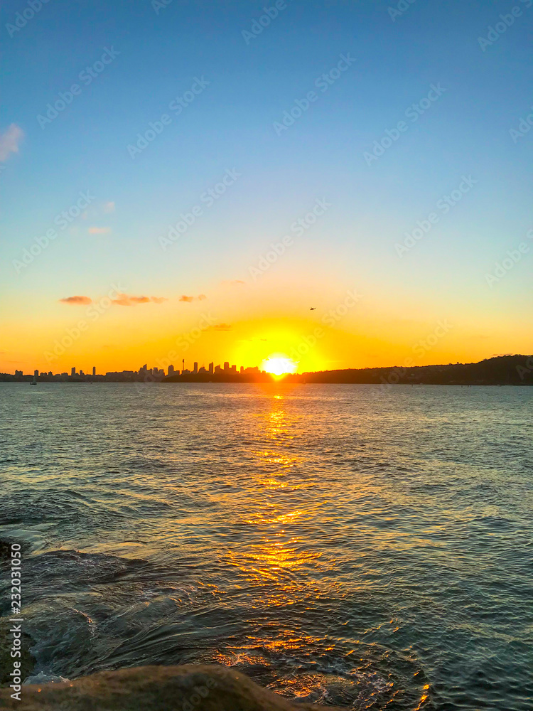 Beautiful sunset with golden beach in Sydney Australia at Watsons bay Beautiful sunset with golden beach in Sydney Australia at Watsons bay