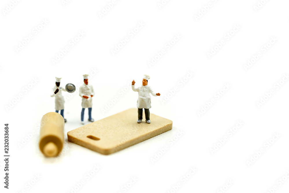 Miniature people : Chef during cooking and working on white background. Miniature people : Chef during cooking and working on white background.