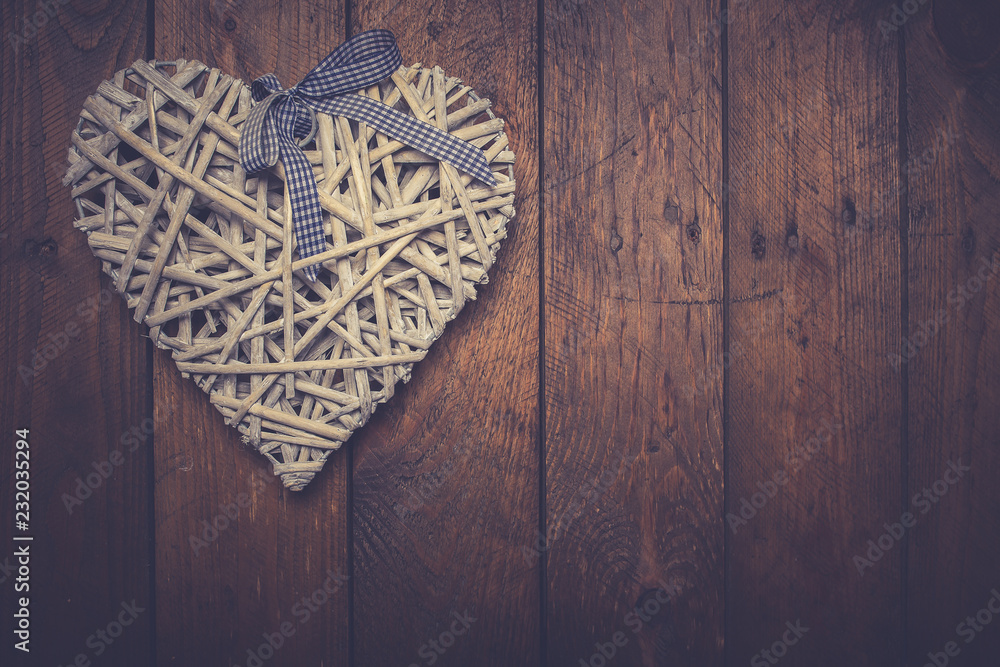 Heart shape on wooden table. symbol of love